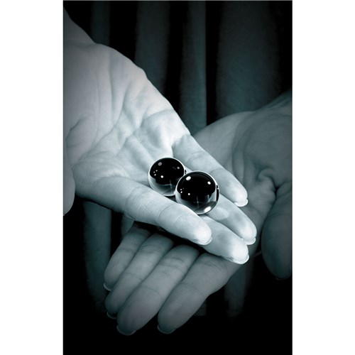 Black Glass Ben Wa Balls hand holding balls