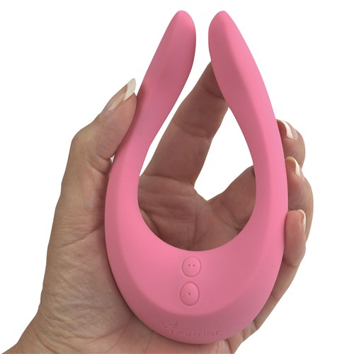 SATISFYER ENDLESS JOY MULTI VIBRATOR placed in hand shot