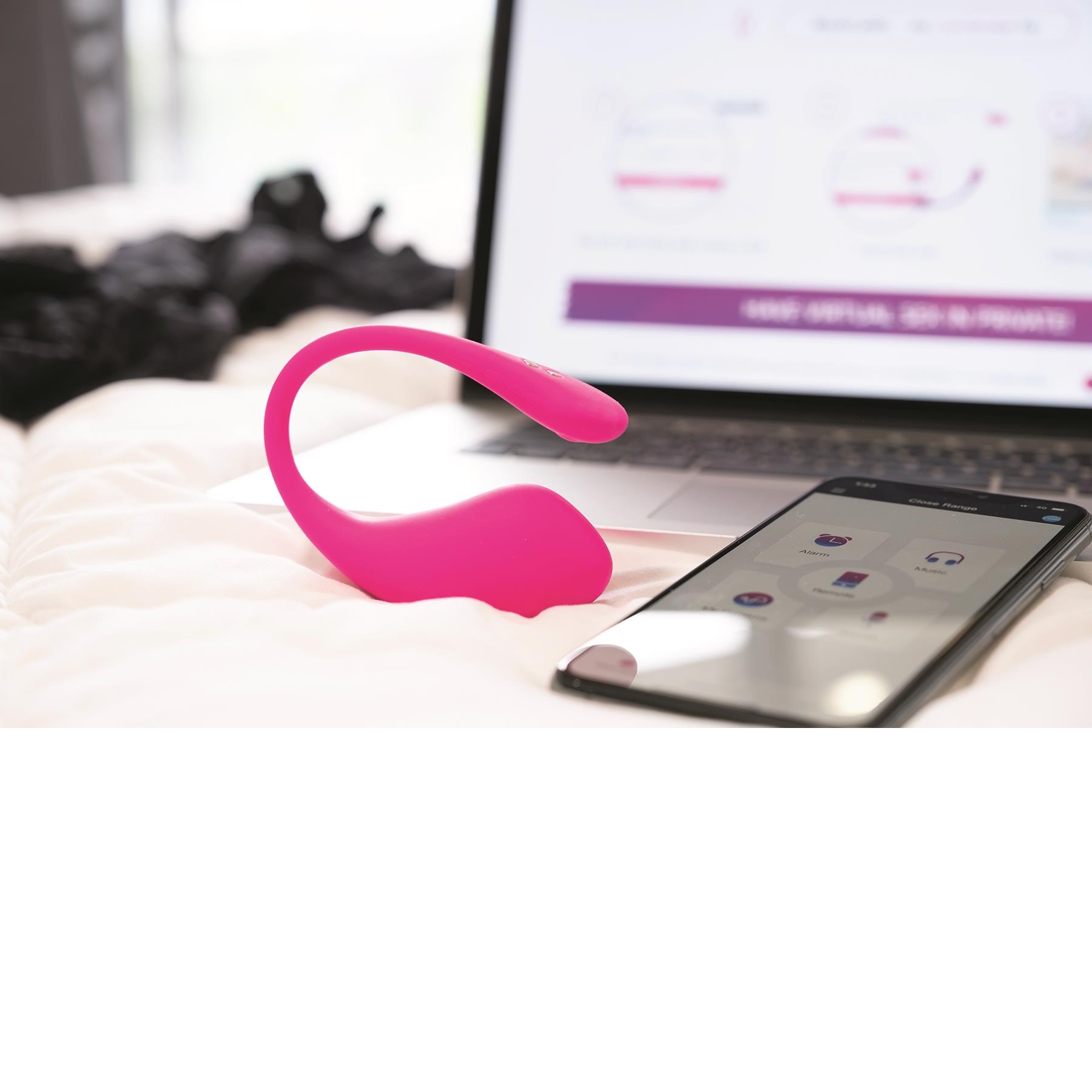 Lovense Lush 3 Bluetooth Bullet Vibrator Lifestyle Shot on Bed #1