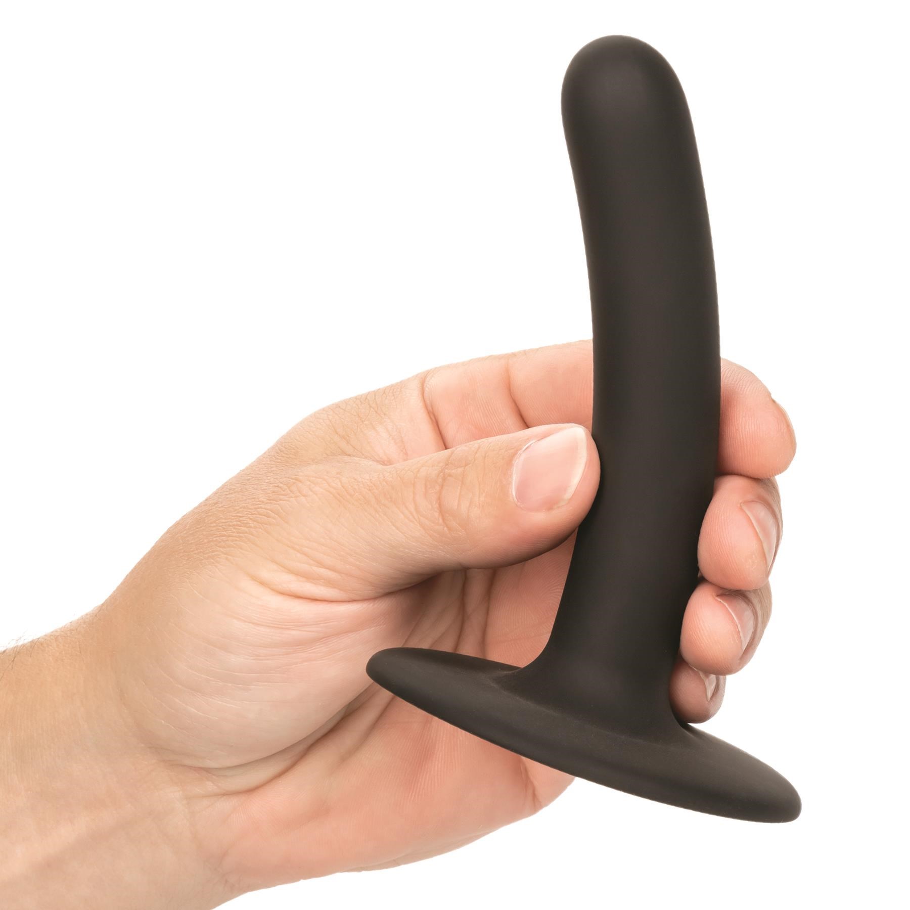 Boundless 4.5 Inch Slim Dildo Hand Shot to Show Size