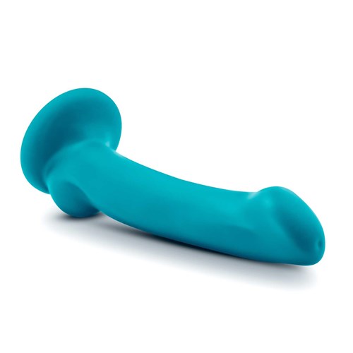 Temptasia Reina G-Spot Dildo With Balls 7" laying on table