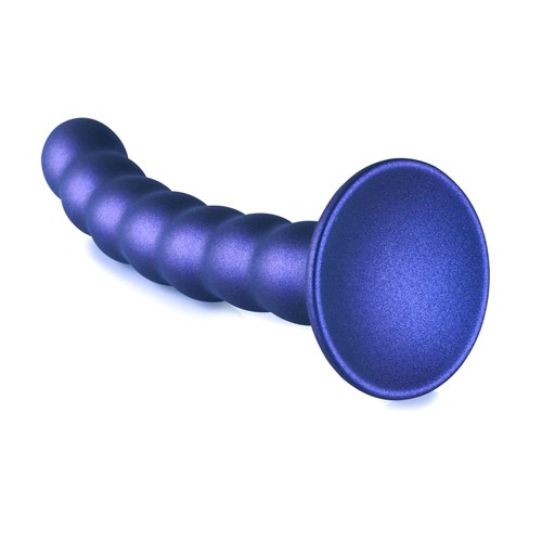 OUCH! METALLIC SILICONE 6.5 BEADED G-SPOT DILDO laying on table suction end forward