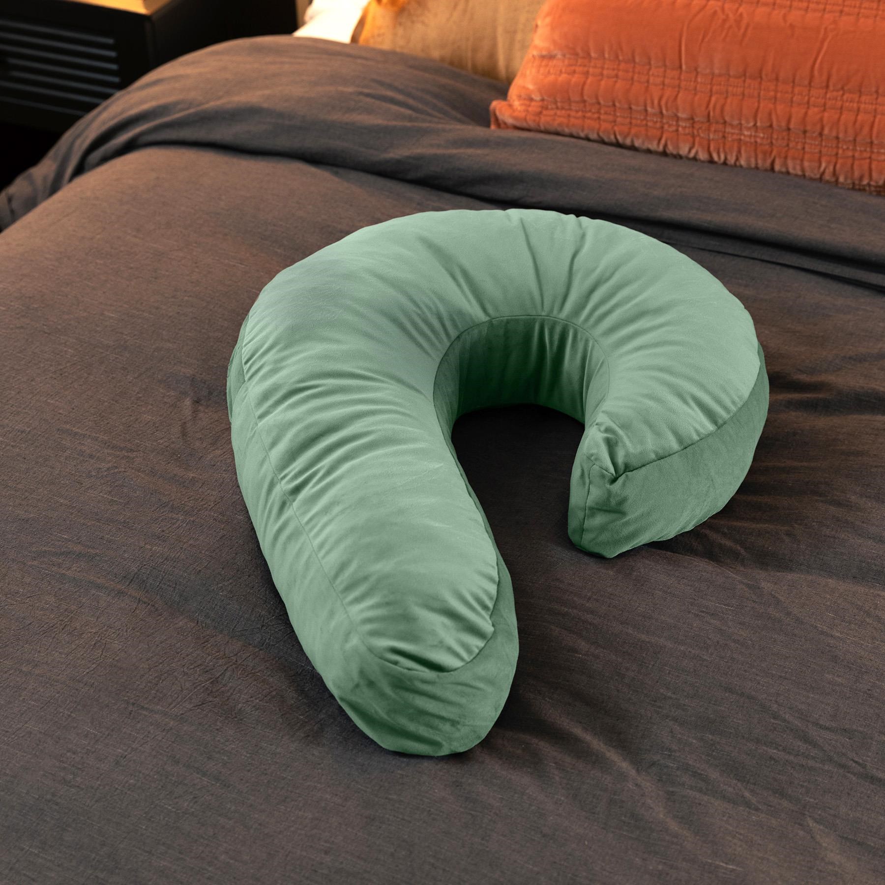 Liberator Side Snuggle Pillow on bed