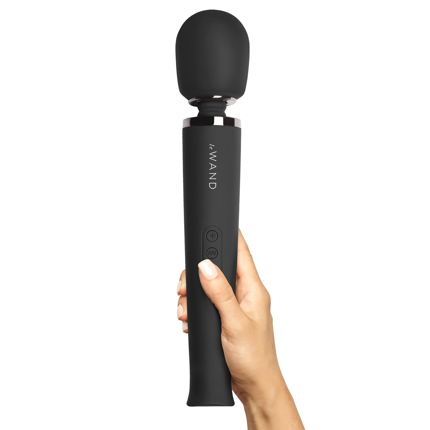 Le Wand Rechargeable Vibrating Wand Massager in hand