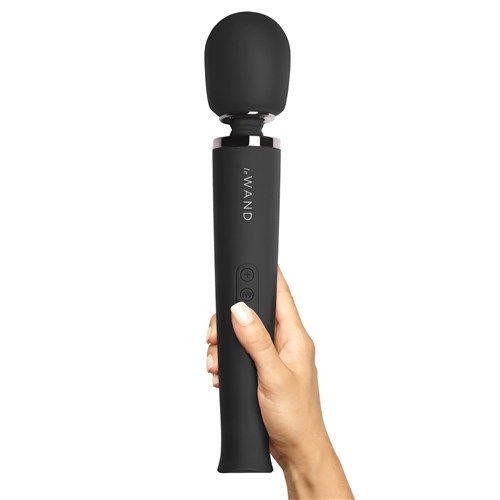 Le Wand Rechargeable Vibrating Wand Massager in hand