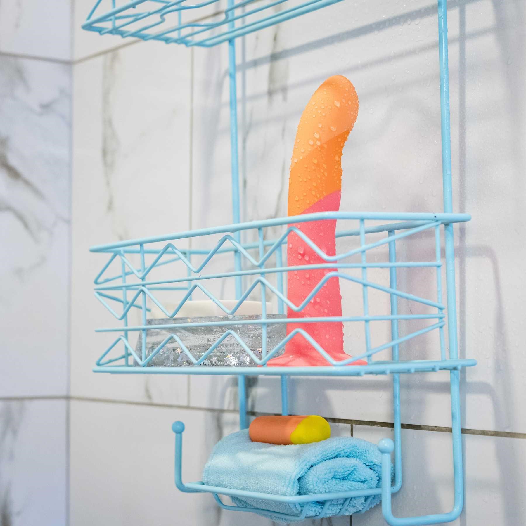 Romp Dizi Dildo shown in a shower