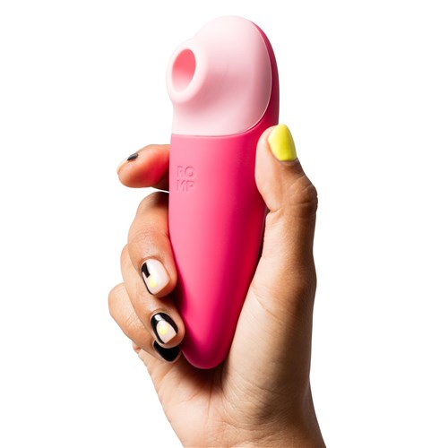 Romp Shine X Pleasure Air Clitoral Stimulator in hand shot