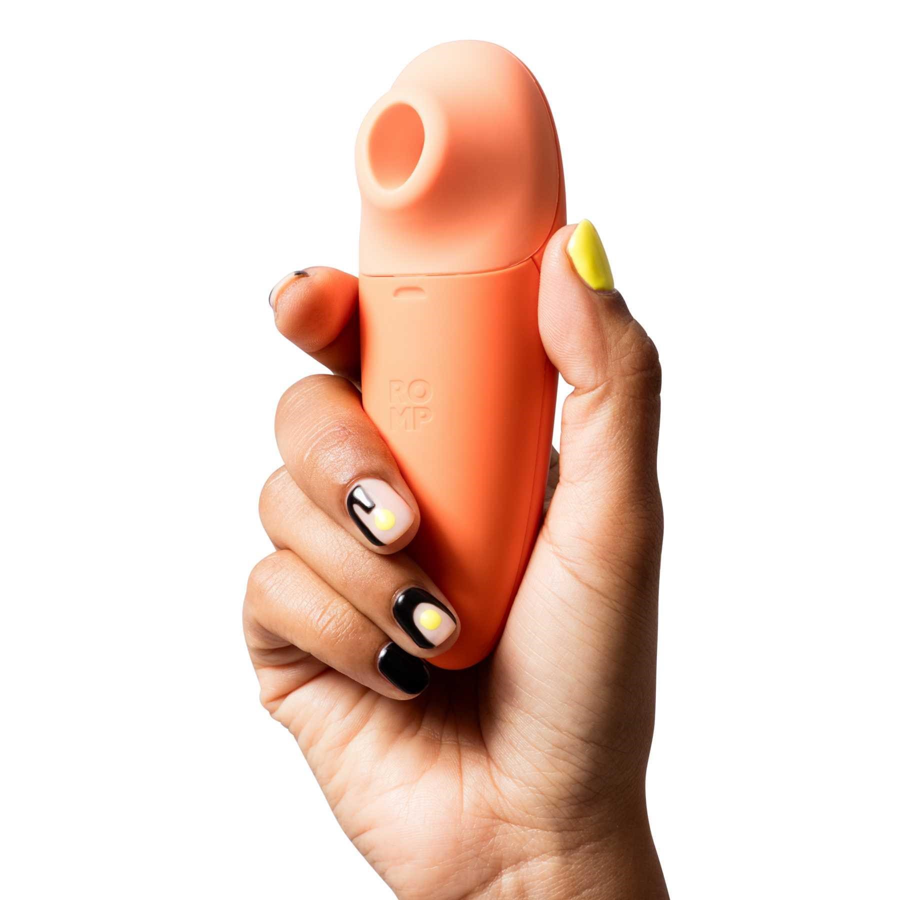 Romp Switch X Pleasure Air Clitoral Stimulator in hand 2