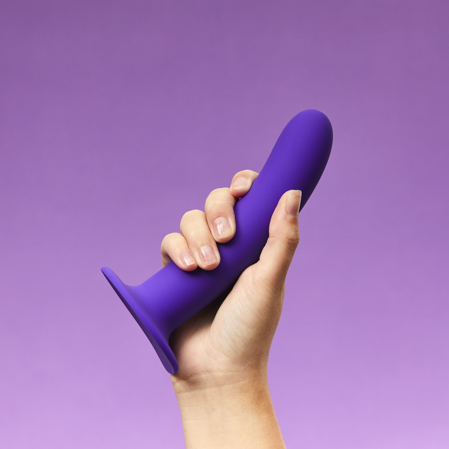 Wild Secrets Desire Silicone Dildo with Suction Cup in hand