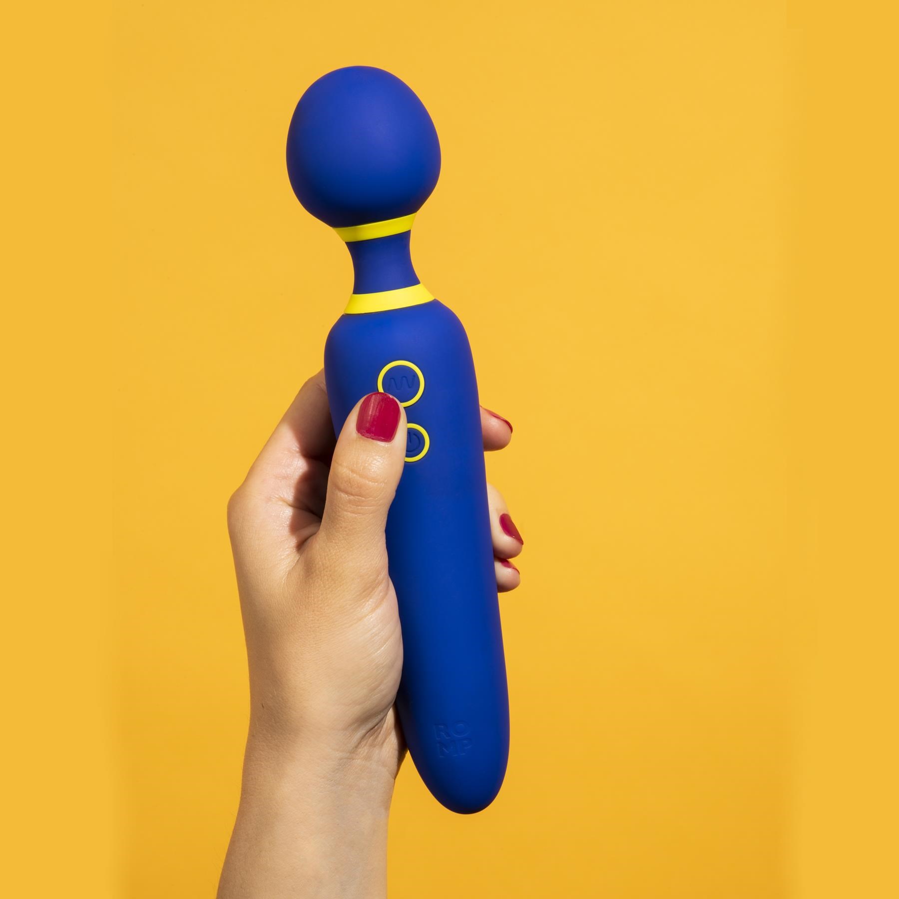 ROMP FLIP WAND MASSAGER BY WE-VIBE in hand