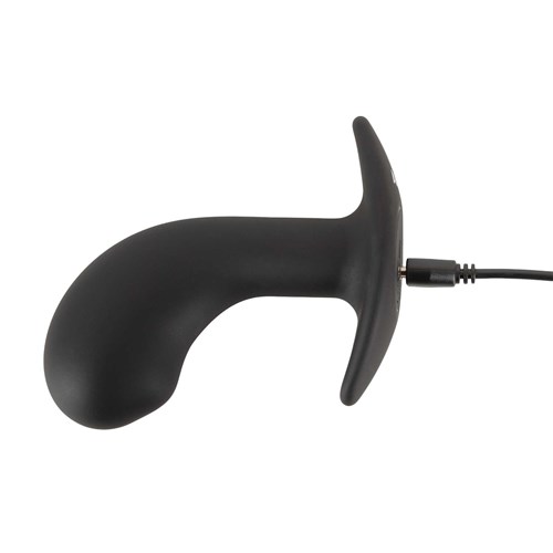 ANOS Big Head Prostate Plug charger cord inserted in base