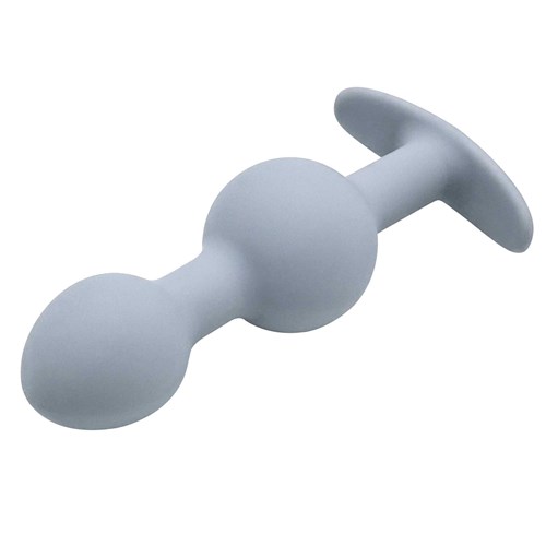 Vibra-Ball Trio Weighted Anal Training Set single plug laying on table