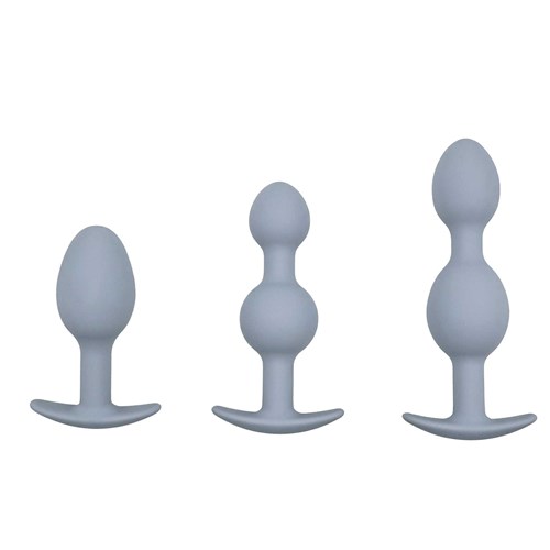 Vibra-Ball Trio Weighted Anal Training Set standing in a row